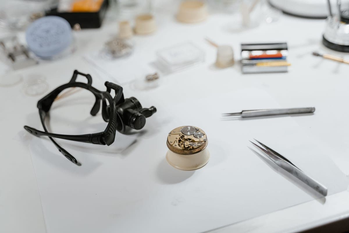 Close-up of watch repair equipment on a bench